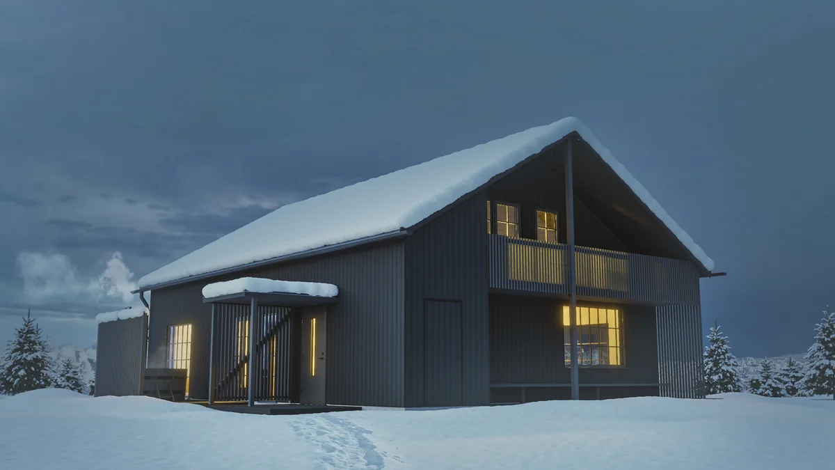 A dark mountain house with warm windows surrounded by snow. Svartfjäll for Engbergs.